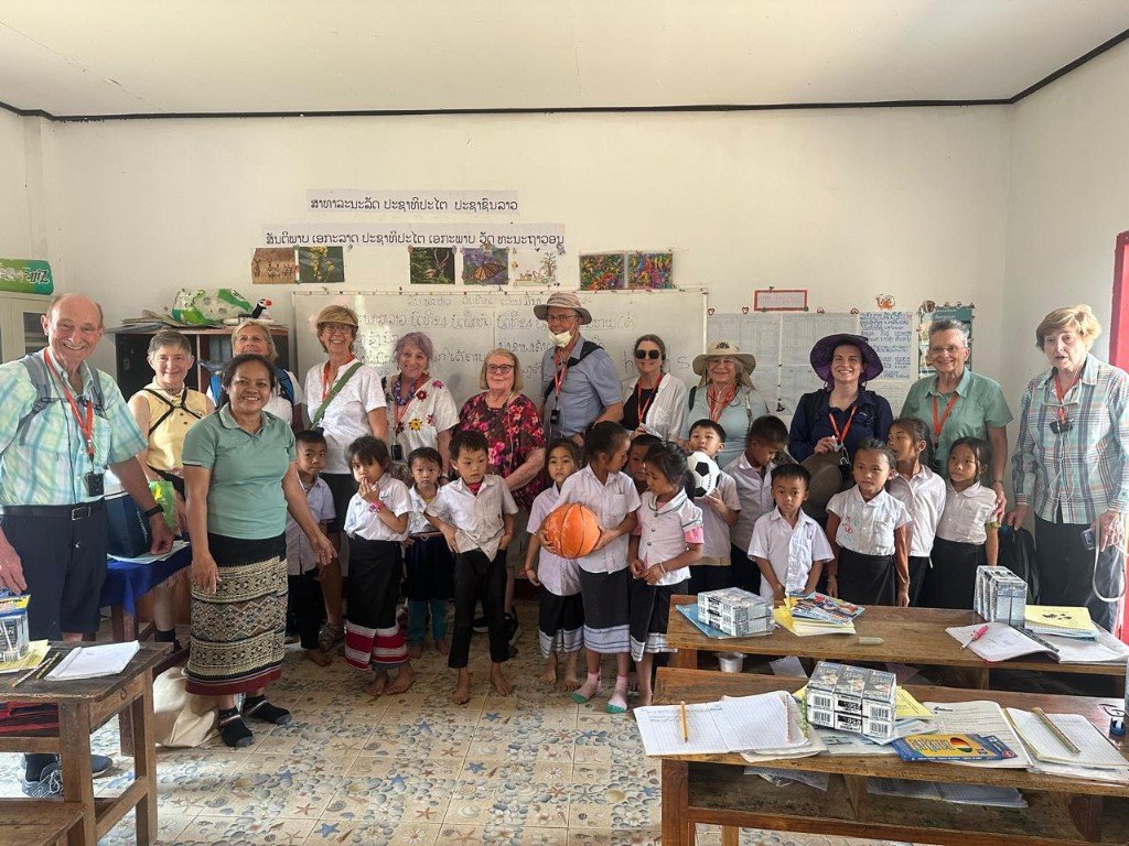 Eco Safari Laos charity visit with local school children in Laos
